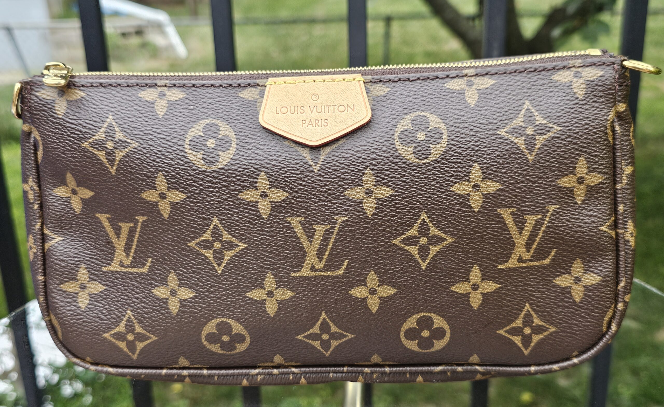 Front view of the Monogram large pochette from the Multi Pochette Accessoires set