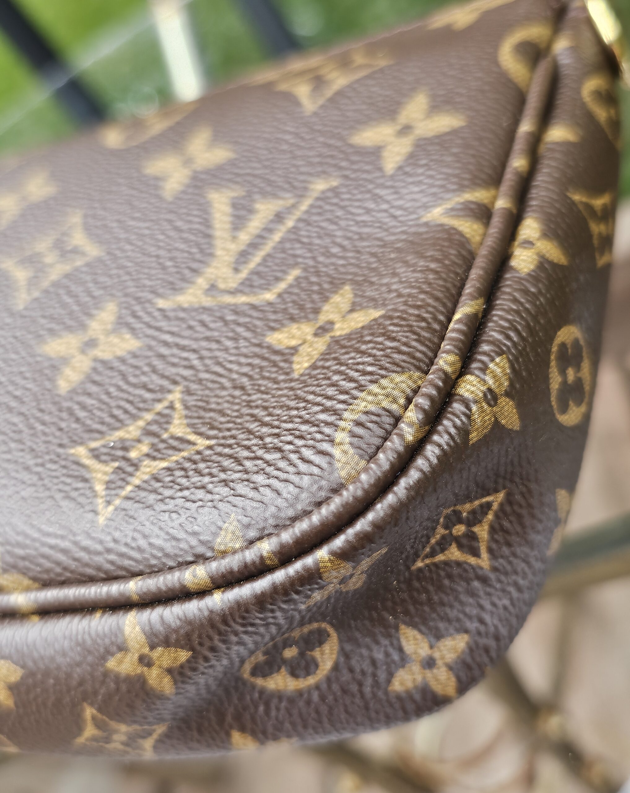 Close-up of an edge and seam on the Monogram Multi Pochette Accessoires large pochette