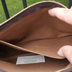 Brown interior lining of the Multi Pochette Accessoires large pochette