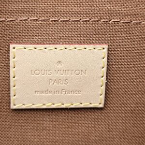 LOUIS VUITTON PARIS made in France tag stitched inside the Monogram large pochette