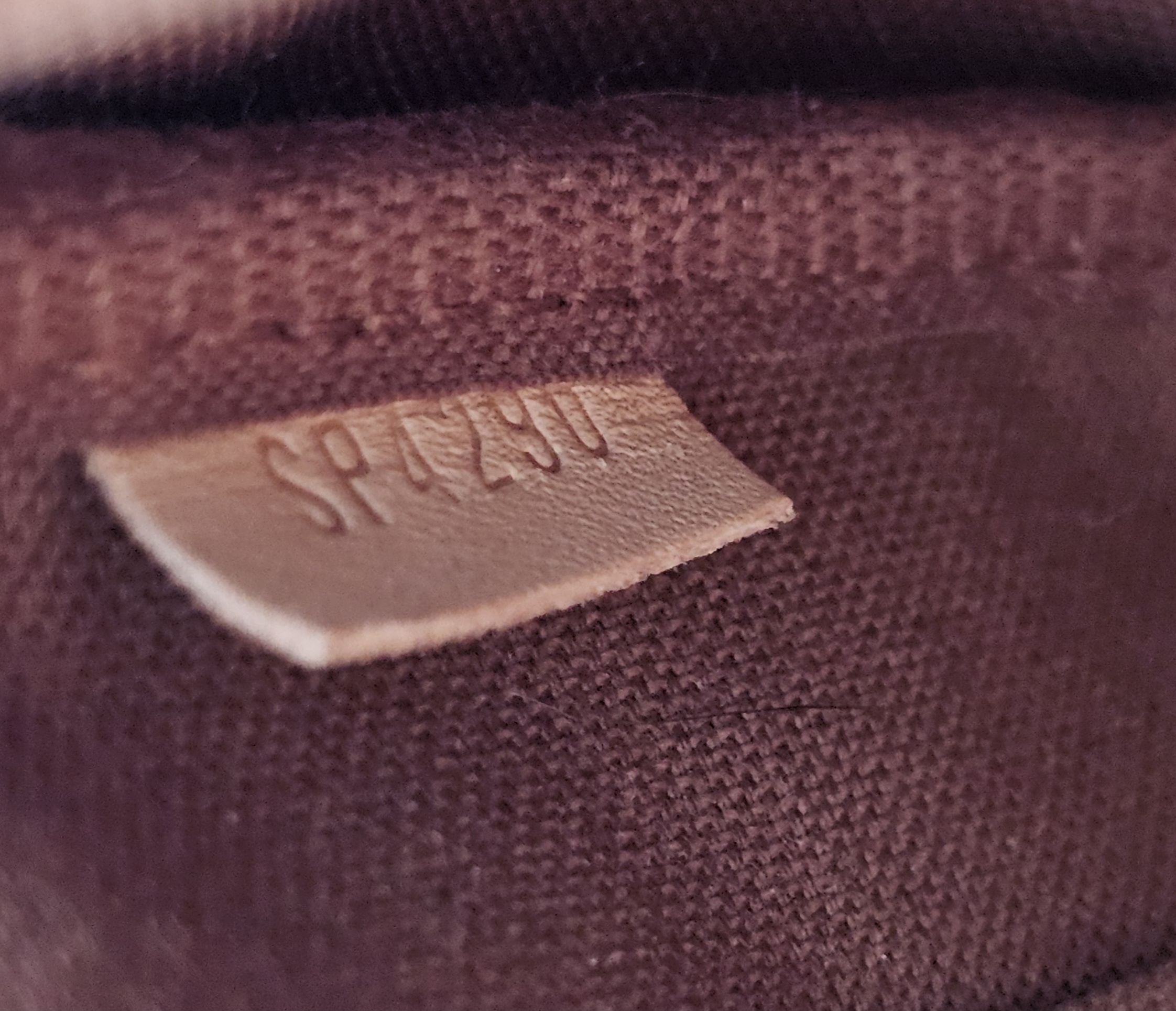 Date code SP4290 embossed inside the Monogram Multi Pochette Accessoires large pochette