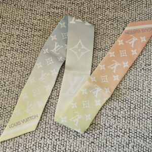 Louis Vuitton Silk LV Aurora Nano Bandeau - laid flat to show the pastel gradient and LOUIS VUITTON lettering