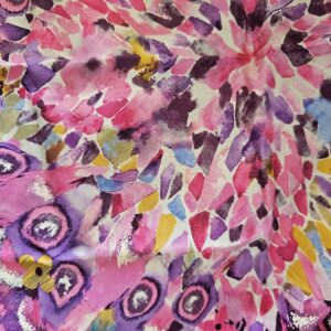 Close-up of the multicolor paint-inspired floral print on the silk