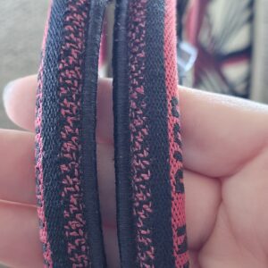 Embroidered handles of the Dioramour Book Tote held together, showing light fuzzing