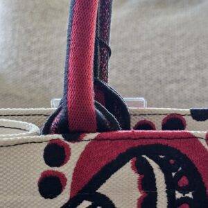 Handle attachment on the Christian Dior Dioramour Book Tote