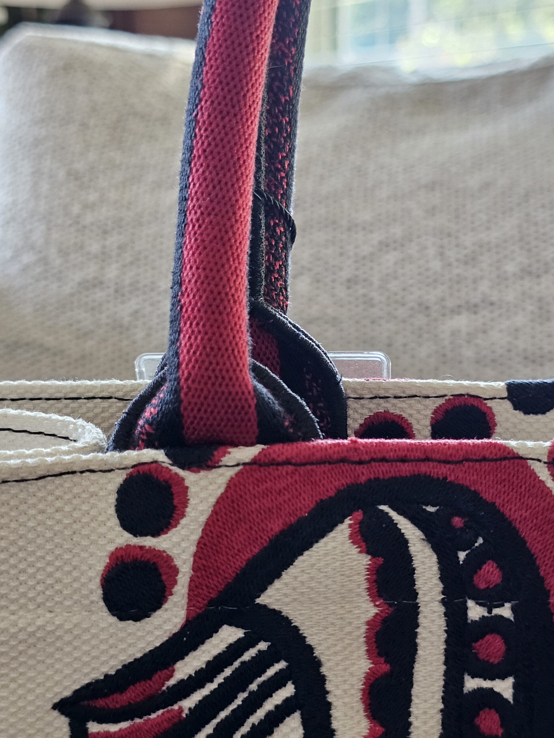 Handle attachment on the Christian Dior Dioramour Book Tote
