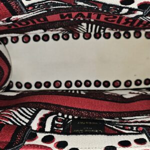 Embroidered interior of the Christian Dior Book Tote showing staining