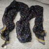 Louis Vuitton Silk Monogram Multicolor Crepe Scarf Black - loosely draped to show the sheer black silk and multicolor Monogram