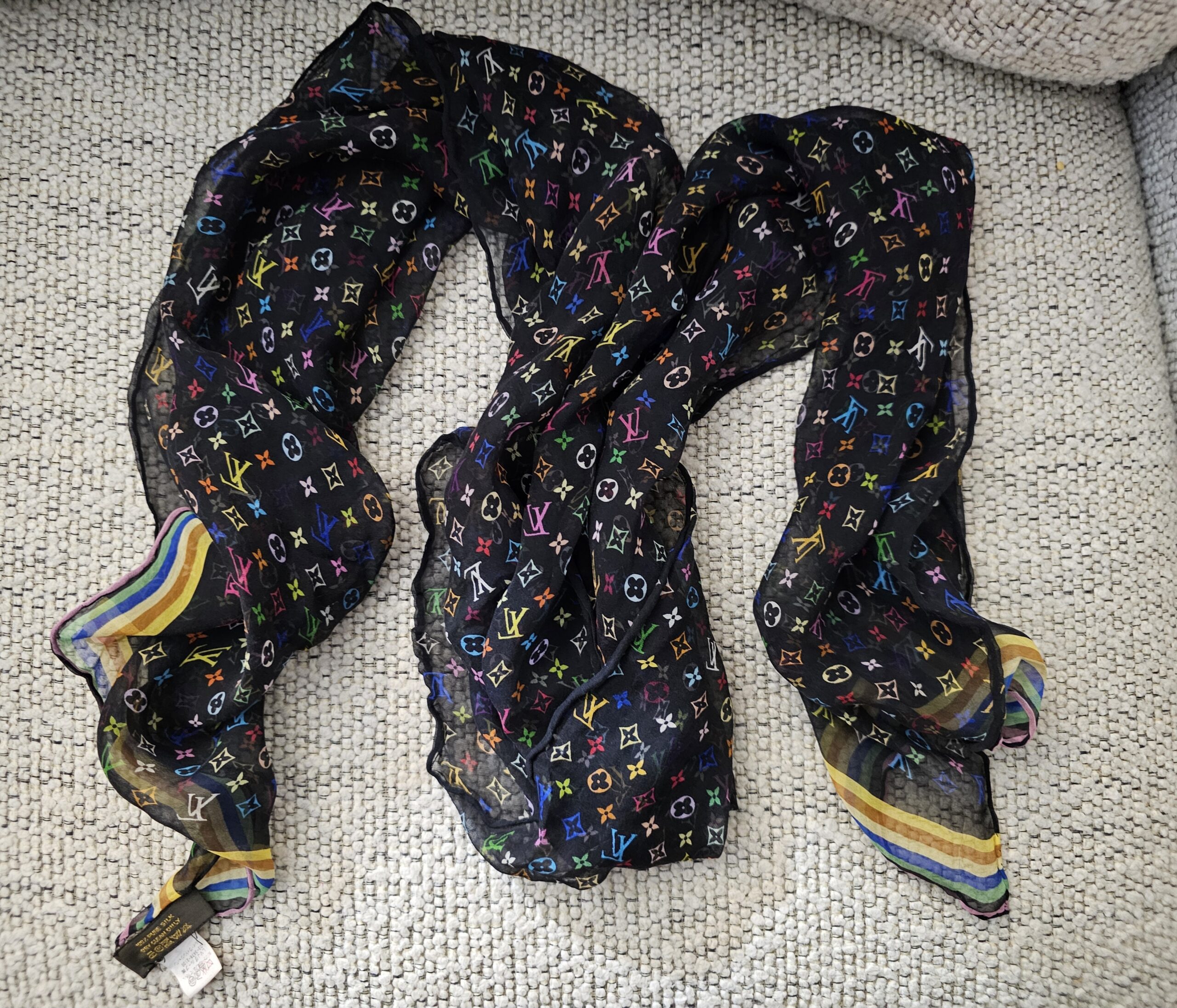 Louis Vuitton Silk Monogram Multicolor Crepe Scarf Black - loosely draped to show the sheer black silk and multicolor Monogram