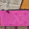 Louis Vuitton Taïgarama Coin Card Holder Fuchsia - front view with the embossed Monogram in fuchsia Taïga leather