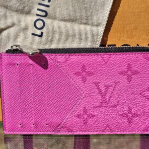 Louis Vuitton Taïgarama Coin Card Holder Fuchsia - front view with the embossed Monogram in fuchsia Taïga leather