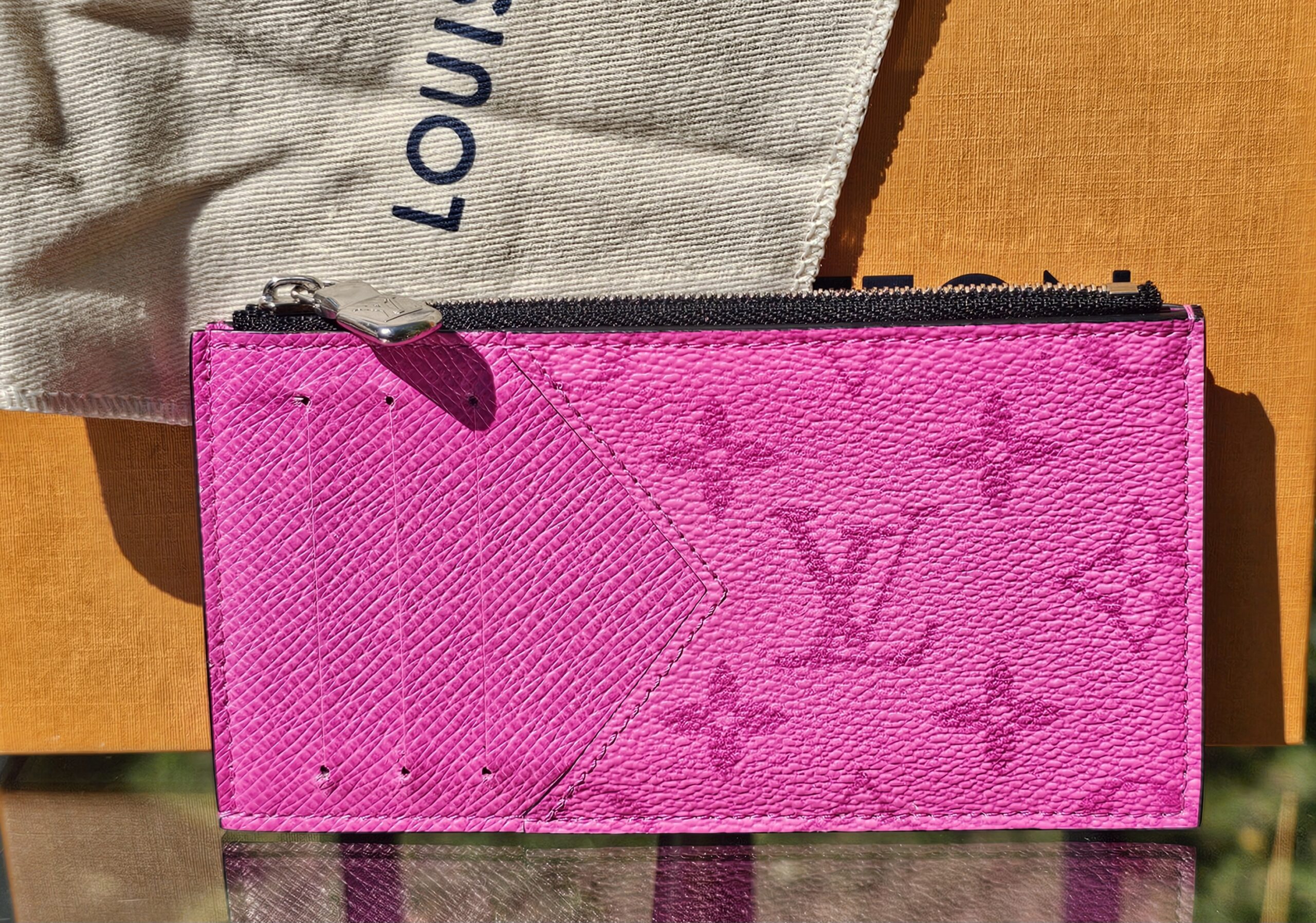 Louis Vuitton Taïgarama Coin Card Holder Fuchsia - front view with the embossed Monogram in fuchsia Taïga leather