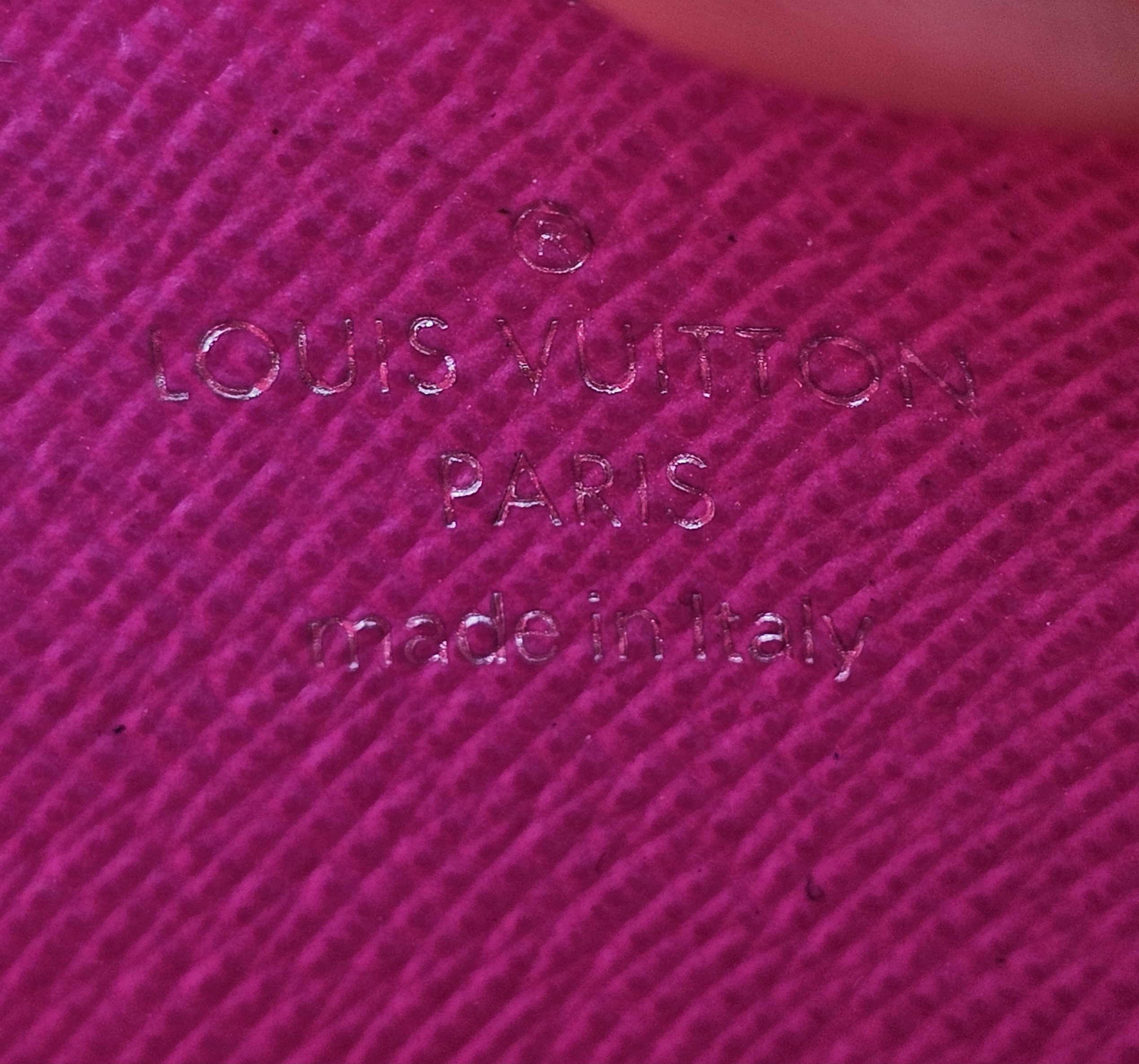 LOUIS VUITTON PARIS made in Italy stamp inside the card holder