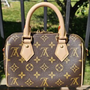 Angled view of the Monogram Speedy Bandouliere 20