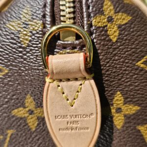 LOUIS VUITTON PARIS made in France heat stamp on the leather tab