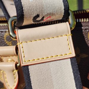 Printed strap folded beside the Monogram canvas