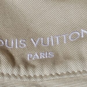 LOUIS VUITTON PARIS embroidered on the smooth side of the hat