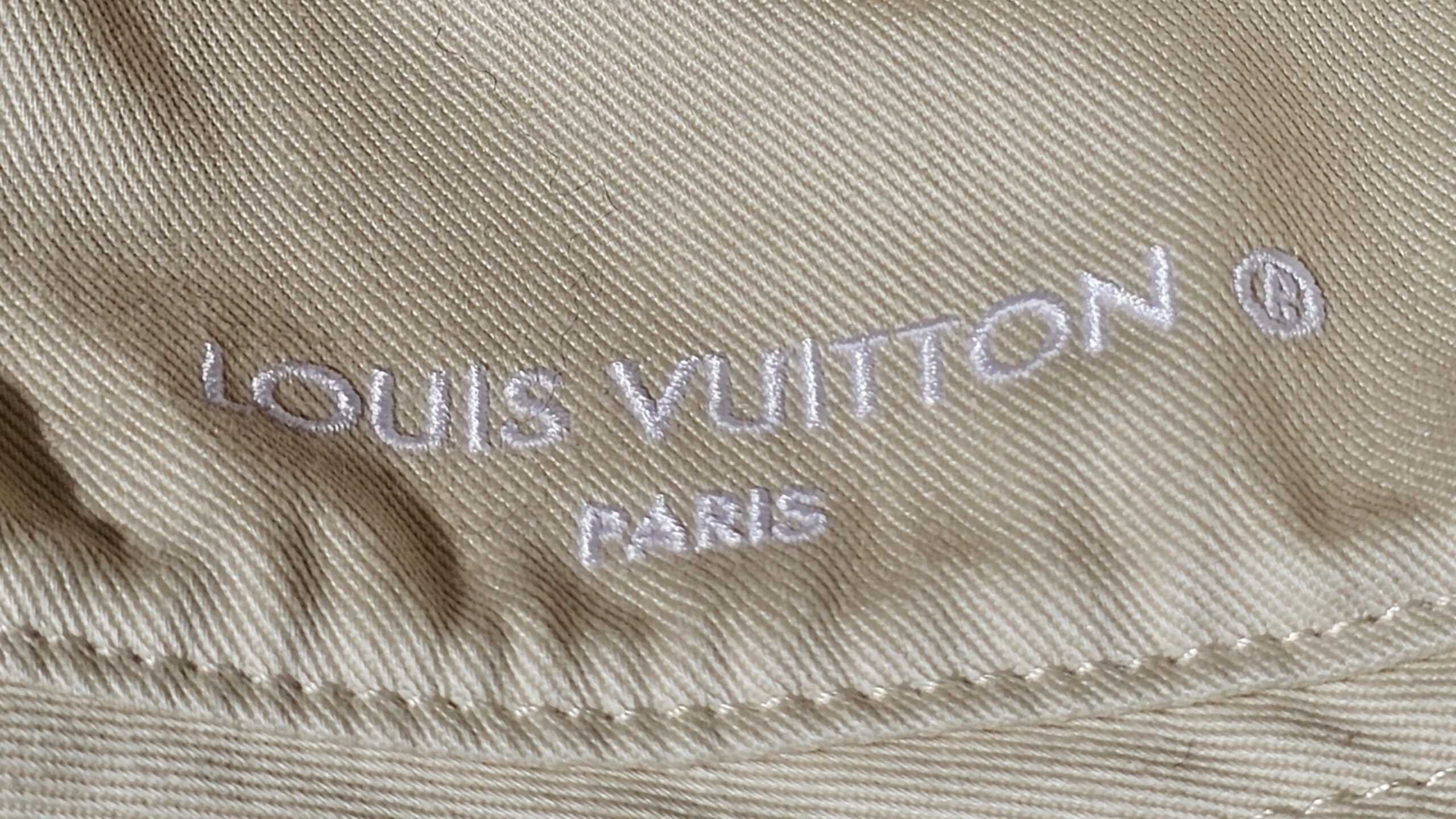 LOUIS VUITTON PARIS embroidered on the smooth side of the hat