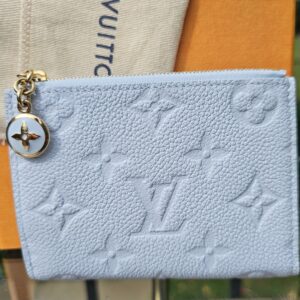 Louis Vuitton Monogram Empreinte Lisa Wallet Blue Olympe - front view with the enamel Monogram flower charm