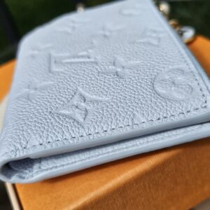 Angled view of the Blue Olympe Lisa Wallet