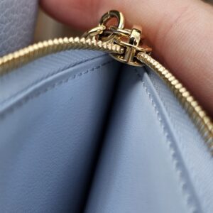 Gold-tone zip pull on the Blue Olympe Lisa Wallet