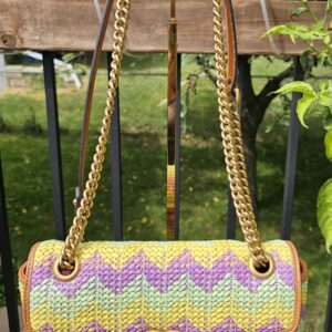 Gucci GG Marmont Multicolor Raffia Flap Shoulder Bag - front view with the aged gold Double G and chain strap