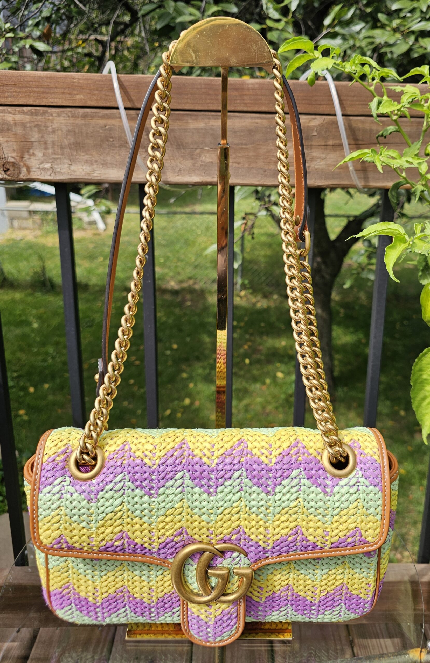 Gucci GG Marmont Multicolor Raffia Flap Shoulder Bag - front view with the aged gold Double G and chain strap