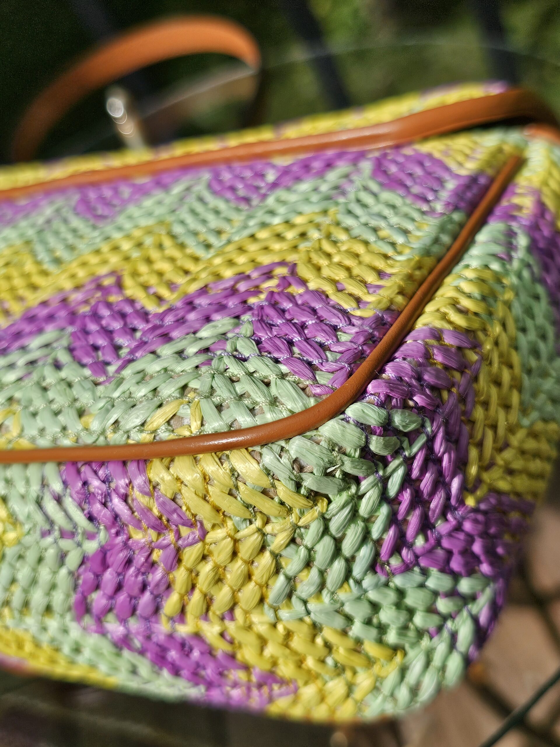 Close-up of the mint, yellow and purple chevron raffia weave