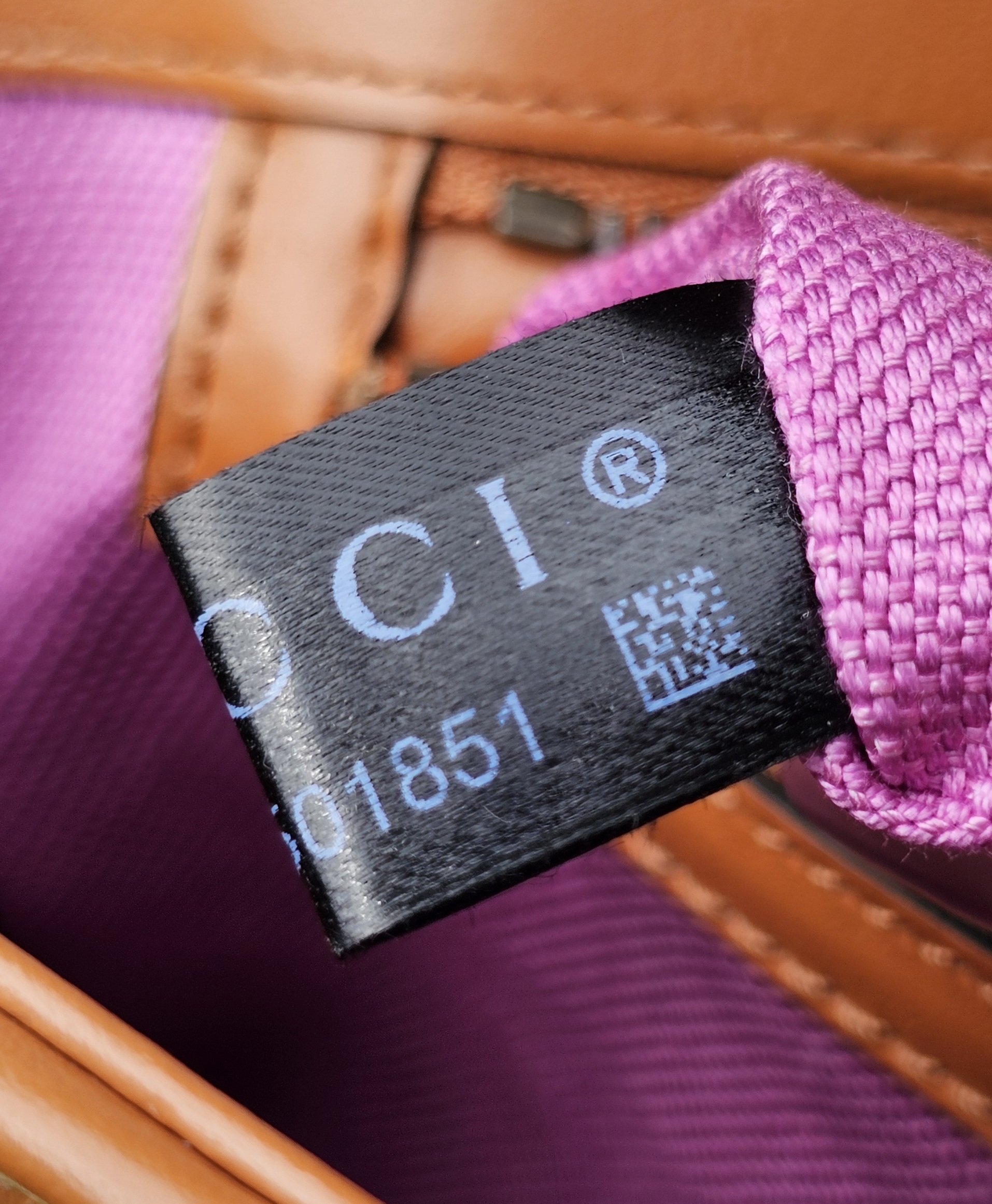 Gucci care tag inside the raffia Marmont