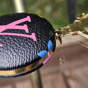 Angled view of the black Multicolor Astropill light