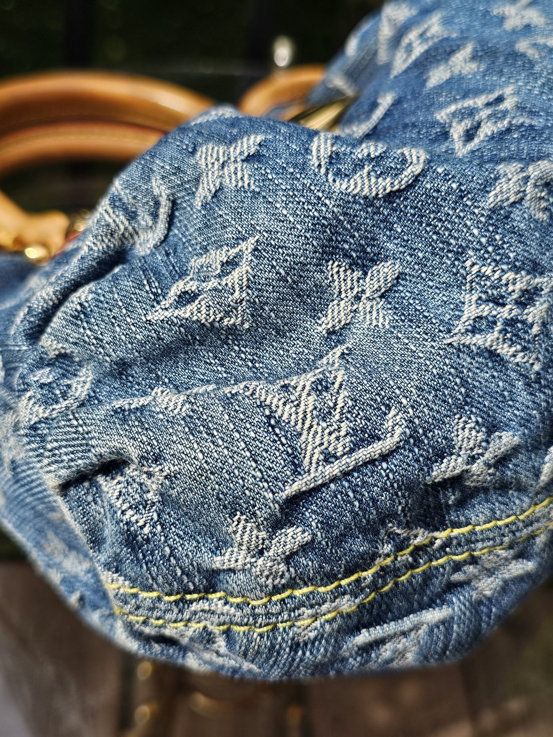 Monogram Denim detail showing the woven LV motifs