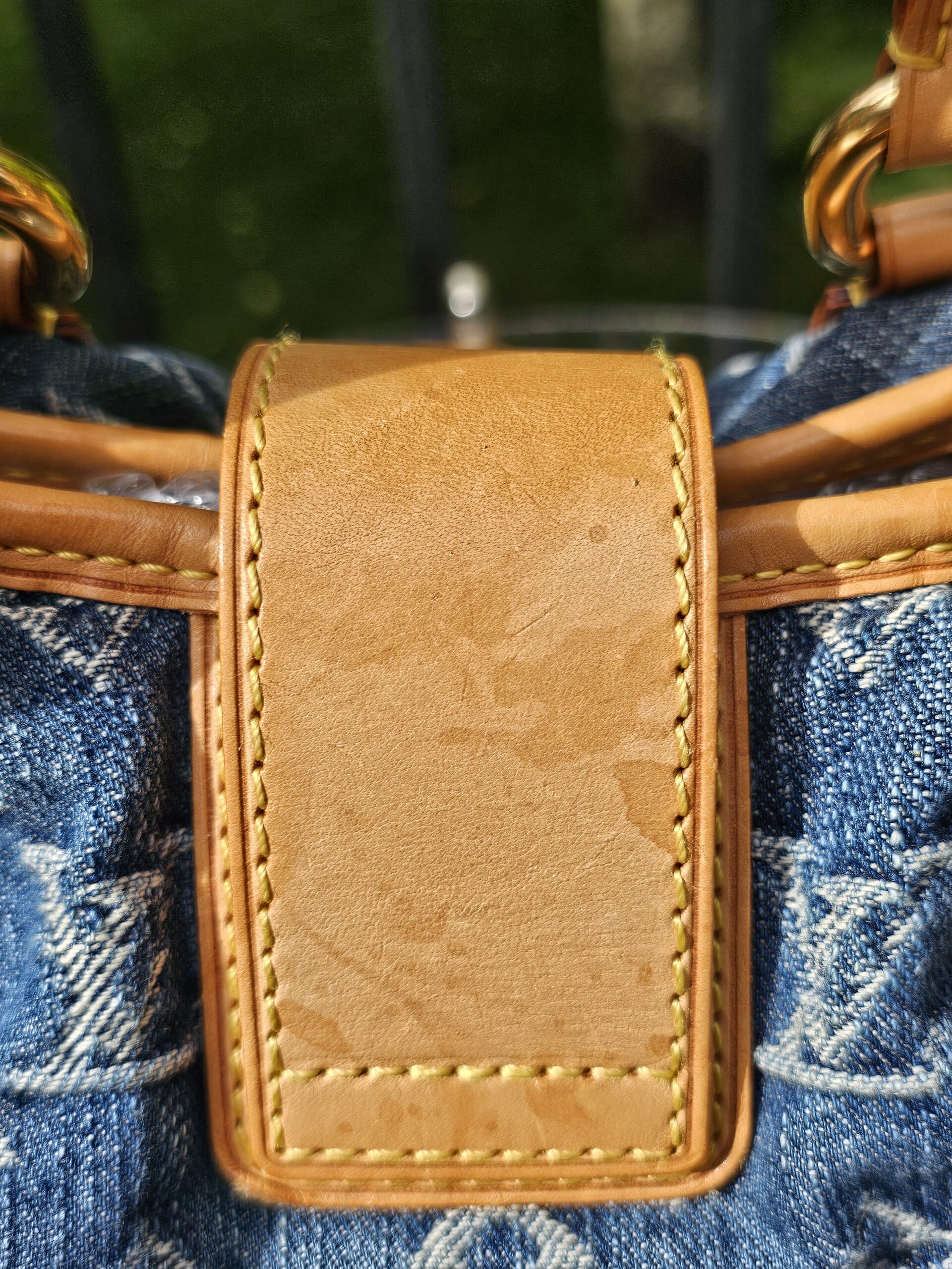 Vachetta flap of the Pleaty showing water spots