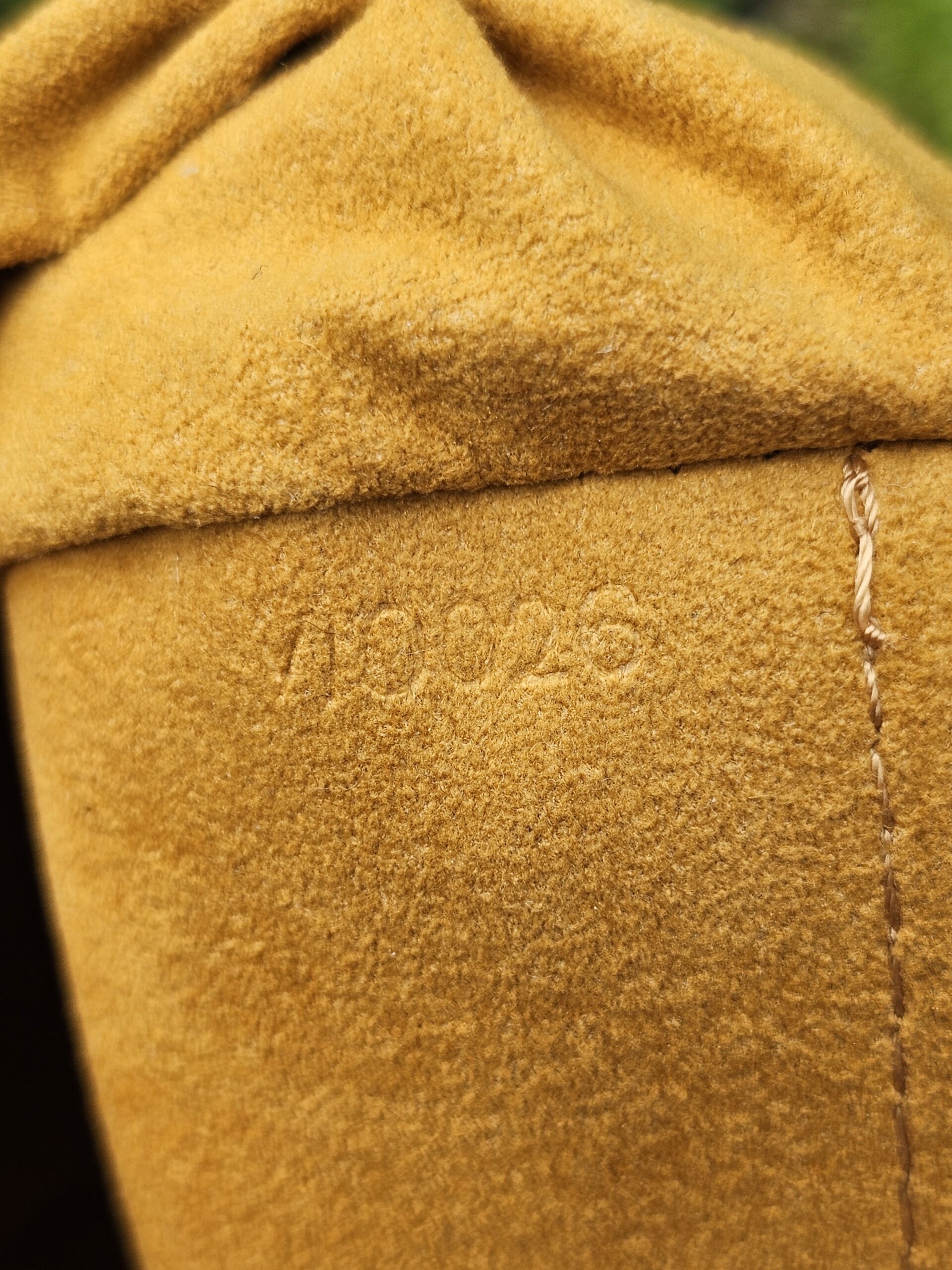 Date code VI0026 stamped inside the Pleaty