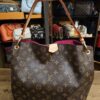 Louis Vuitton Monogram Graceful PM Pivoine - front of the hobo with its vachetta strap and pink interior showing