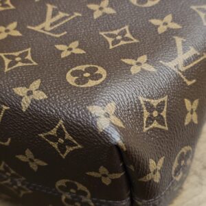 Third corner of the Monogram canvas at the base
