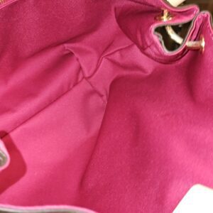 Interior side panel of the Graceful PM in Pivoine pink