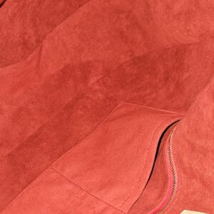 Interior pocket in the red microfiber lining
