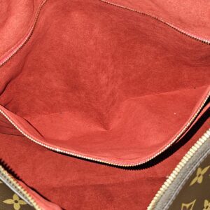 Clean red microfiber lining inside the Slouchy MM