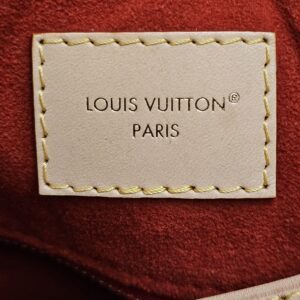 LOUIS VUITTON PARIS patch on the red interior