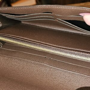 Interior zip coin compartment inside the Sarah Wallet