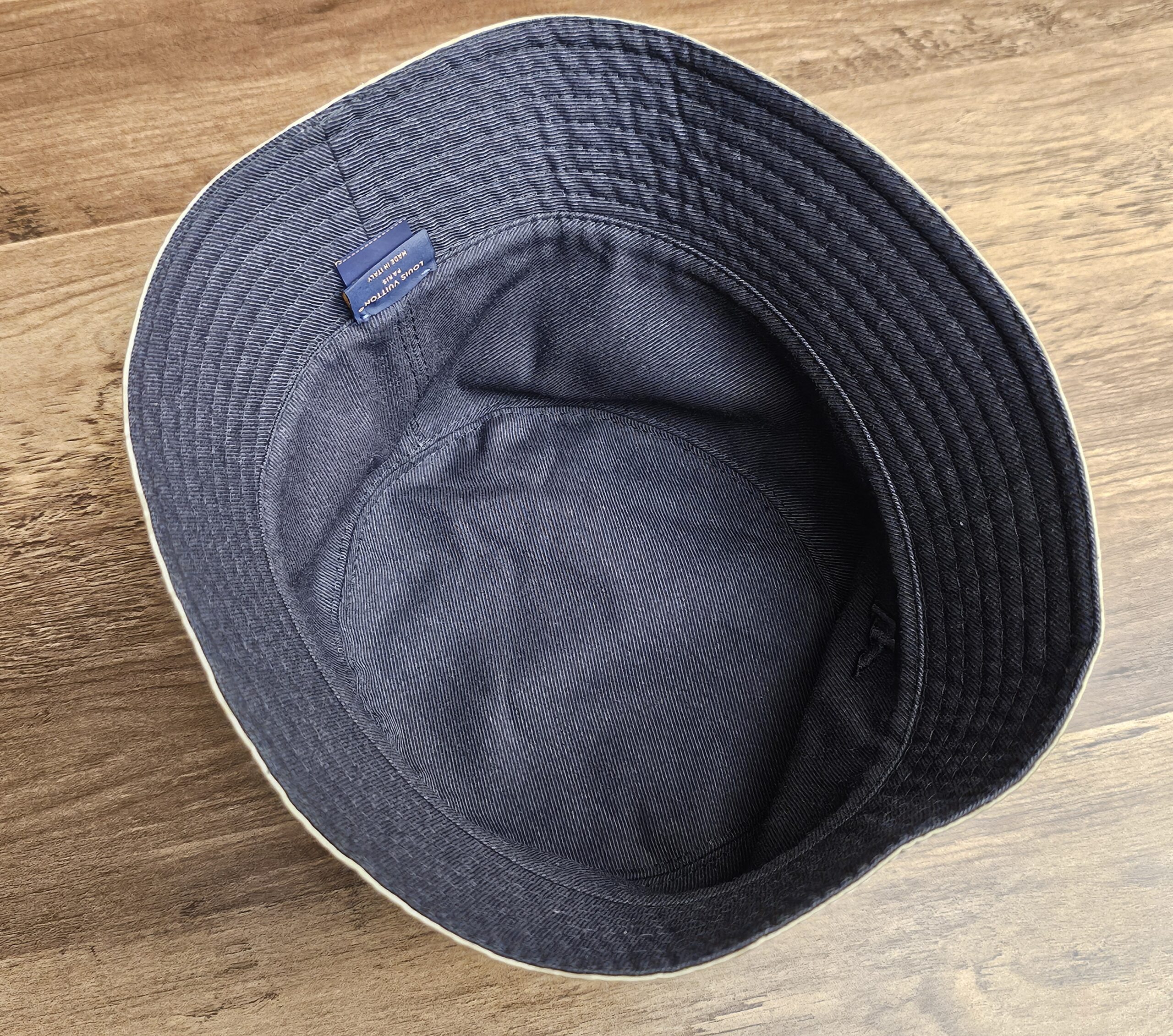 Hat turned over to show the graphite side as the lining