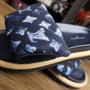 Single mule at an angle showing the Monogram nylon strap