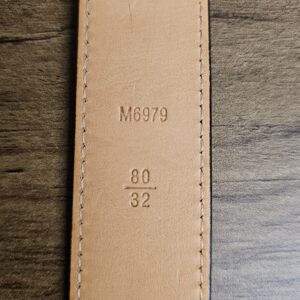Leather underside stamped M6979 and size 80/32
