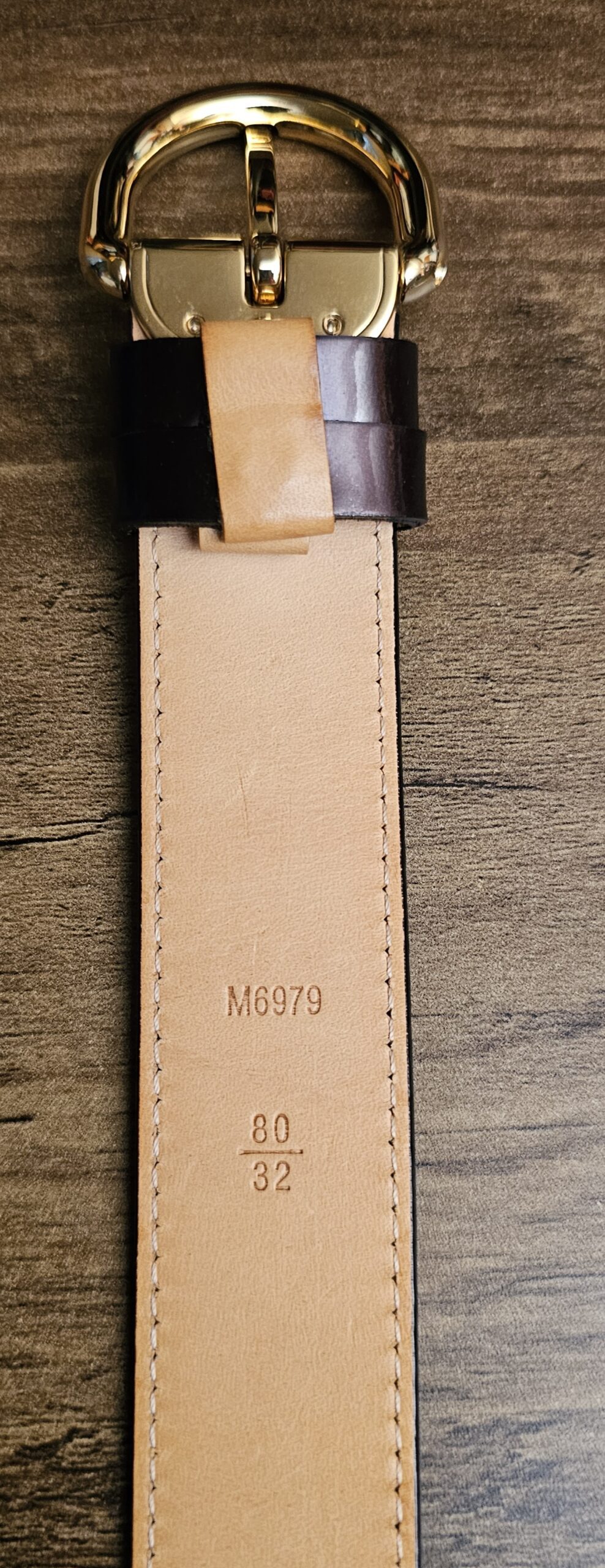 Natural leather underside of the belt with the buckle