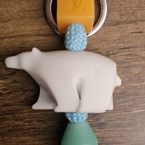 Orange LV cube above the white resin polar bear