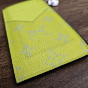 V-shaped slip pocket against the Monogram canvas
