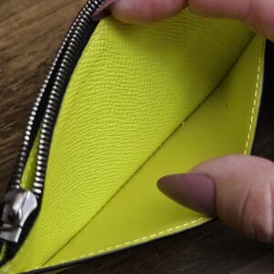 Yellow interior of the zipped compartment