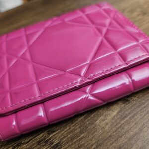 Wallet seen from above showing the raised Cannage pattern