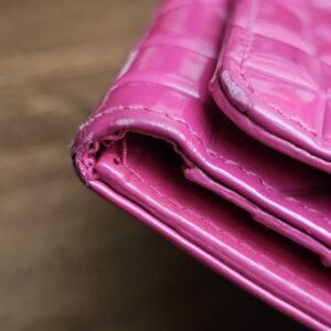 Corner of the patent wallet with visible rubbing