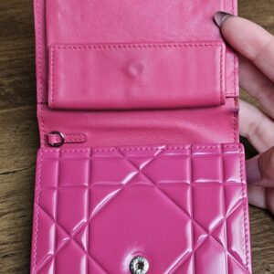 Wallet opened to show the snap and coin compartment